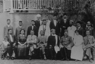 Gandhi during the visit of Indian political leader Gopal Krishna Gokhale to South Africa, Durban, 1912. Below row, center, from left: Dr. Hermann Kallenbach, Gandhi (1912)