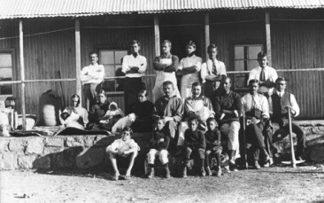 Members of the Tolstoy Farm created by Gandhi in South-Africa. Sitting (C): Dr. Hermann Kallenbach, M.K. Gandhi (1910)